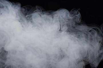 Beautiful white smoke with natural pattern on black background with charming pattern