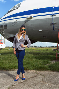 Young woman on the airfield