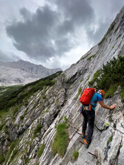 Fototapeta premium Hike to Zugspitze by using the via ferrata hike trail path