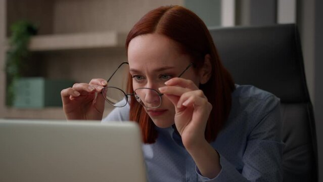 Caucasian office worker entrepreneur female girl employer with laptop woman business manager businesswoman with bad vision eyesight confused with broken eyeglasses blurry see looking problem glasses