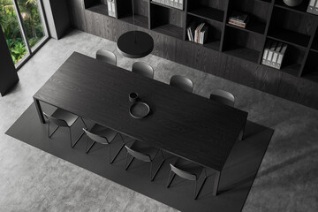 Top view of office room interior with meeting board and shelf near window