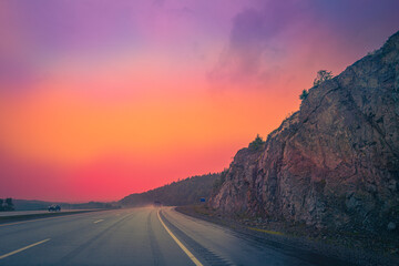 TransCanada Highway rainy sunset roadside landscape on Route 1 in St John, New Brunswick, Canada, summer storm is coming to the east coast