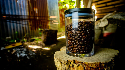 delicious coffee beans in a jar