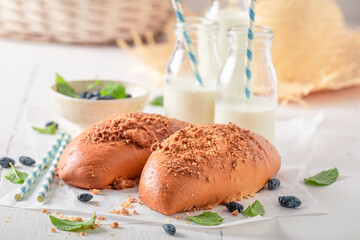 Fresh blueberry yeast cake with glaze and crumble.