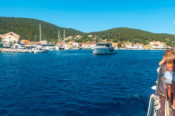 Boats in the fishing port of Fiskardo village on Kefalonia island, Greece