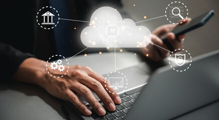Cloud computing network connection, a man using a laptop with a conceptual cloud icon on the screen, a solution for data storage and backup with mobility and accessibility.