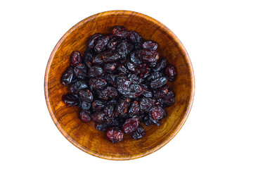 Dried Cranberry in a wooden bowl top view 