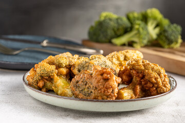 Fried breaded broccoli on the table.