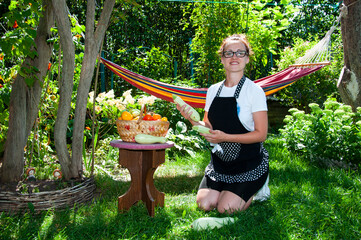 woman farmer with vegetable harvest. organic food and eco farming. greengrocer woman outdoor....