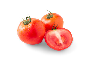 Whole and half red tomatos, green leaf isolated on white background. Freshness vegetable colorful healthy food for vegetarian. Fruit with water drop, closeup. Juicy tomato for ketchup or salad