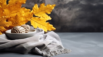 Autumn table setting with dry yellow oak leaves, fall decoration on grey. Generative Ai