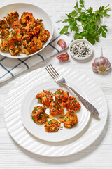 bang bang broccoli bites on plate, top view