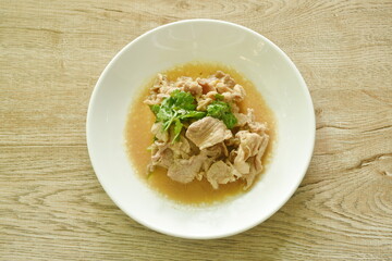 stir fried pork meat and belly with garlic and pepper in oyster sauce on plate 