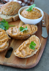 Roasted eggplant, pepper, tomato and garlic spread over slices of bread.
