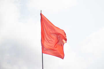 Red Flag an blue clear Sky