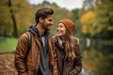 Photo sur Plexiglas Brugges a beautiful young caucasian couple posing for a selfie photo on a forest walk on a vacation in autumn