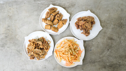 Crispy Delights Platter: Chicken Skin, Fried Mushroom, Bakso Tahu Special, and French Fries