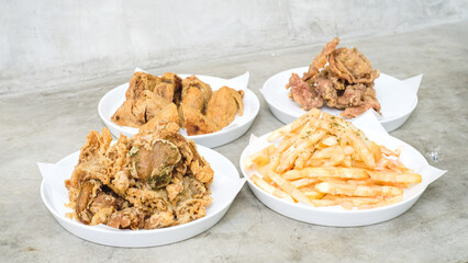 Crispy Delights Platter: Chicken Skin, Fried Mushroom, Bakso Tahu Special, and French Fries