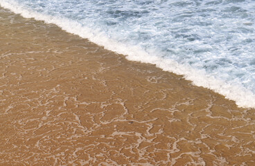 white background of a beach with waves in the ocean