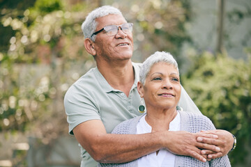 Love, hug and senior couple in a garden with care, trust and support, thinking and bond outdoor. Happy, marriage and elderly man with old woman in backyard embracing retirement, relax and smile