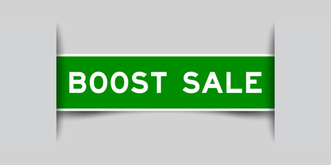 Green color square label sticker with word boost sale that inserted in gray background