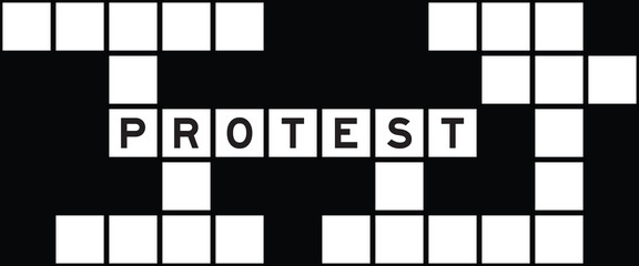 Alphabet letter in word protest on crossword puzzle background