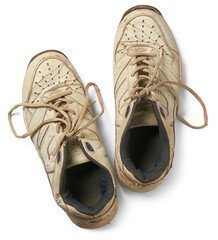 pair of old used shoes isolated white background, dirty sport shoes or sneakers with tied lace...