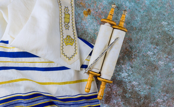 Synagogue with torah scroll, pray shawl tallit integral symbols in jewish religious holyday festivals