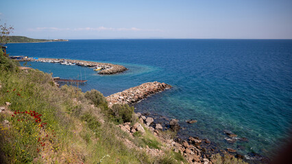 Seaside wave blocker. seaside coast blue sea and sky