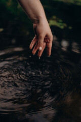 hands in water