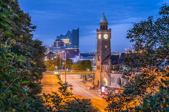 Pegelturm St. Pauli Landungsbr&uuml;cken and Elbphilharmonie concert hall at night, Hamburg, Germany