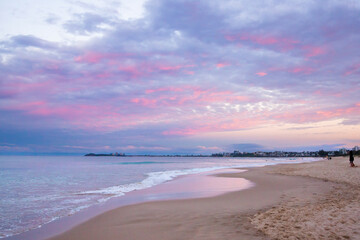 beach sunset with fairy floss clouds