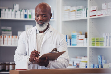 Pharmacy, clipboard and mature black man writing notes of product description, medical drugs information or clinic stock take. List, pills and African pharmacist doing store inventory of supplements