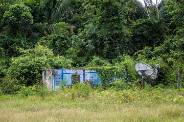 Abandoned satellite dish dirty and damage. Social issues