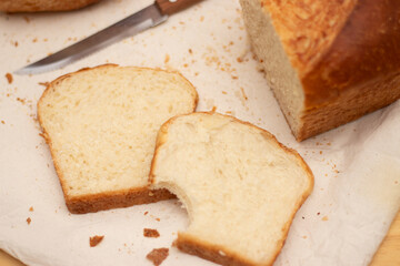 slices of bread with a bite on it, Fresh bread