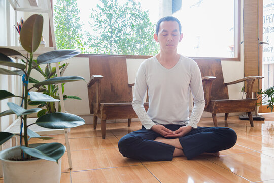 Meditation, Zen Asian Man In Relax, Peace And Mental Health In House Living Room