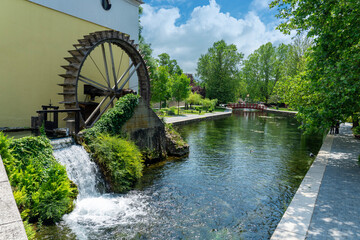 tapolca mill wheel in the city pond downtown park in Hungary - obrazy, fototapety, plakaty