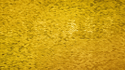 luxurious golden yellow marble brick of wall background and pattern texture. copy space in...