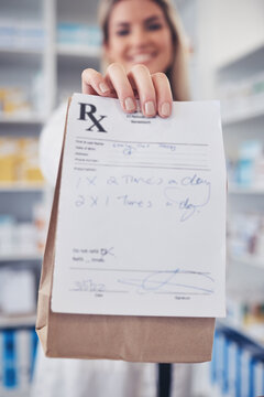 Pharmacy, hand and prescription medicine with paper in a bag for healthcare, drugs and pharmaceutical. Closeup of a pharmacist or medical worker with rx information, drugstore and retail service
