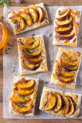 Peach pastry tarts with cheese, pepper, honey, thyme