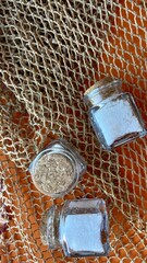 three small jars of salt