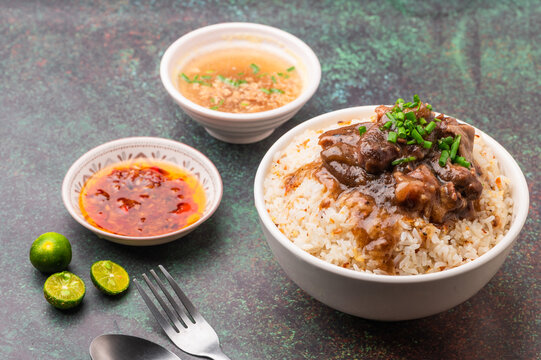 Pares, also known as beef pares, is a term for a serving of Filipino braised beef stew with garlic fried rice, and a bowl of clear soup. (Pares rice topping)