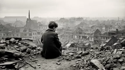 Tuinposter Parijs A child lonely in the destroyed city after the war