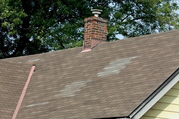 Roof repair with new replacement shingles
