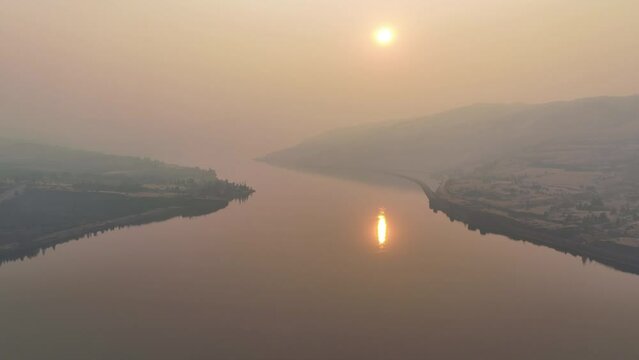 Smoke from seasonal wildfires hover over the the Columbia River Gorge, a federally protected scenic area forming the boundary between Washington and Oregon. 