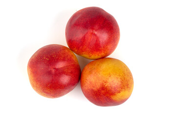 Fresh nectarines. Organic fruits, isolated on white background.