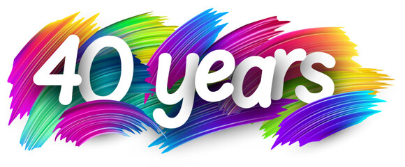 40 years paper word sign with colorful spectrum paint brush strokes over white. Vector illustration.