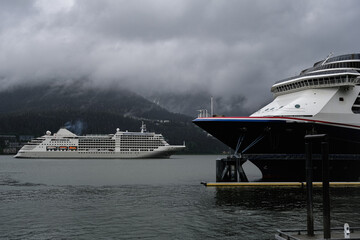 Luxury Silver cruiseship cruise ship liner Muse arrival into port of Juneau, Alaska during nature...