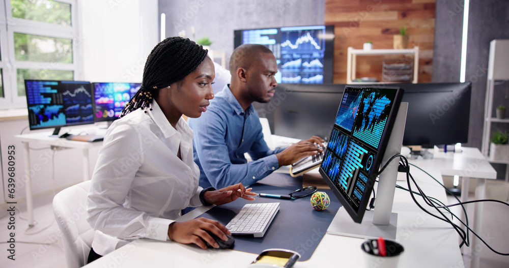 Poster african financial data analysts using dashboard on screens