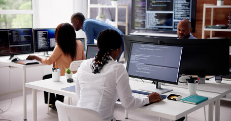 African Business Team Working On Computer